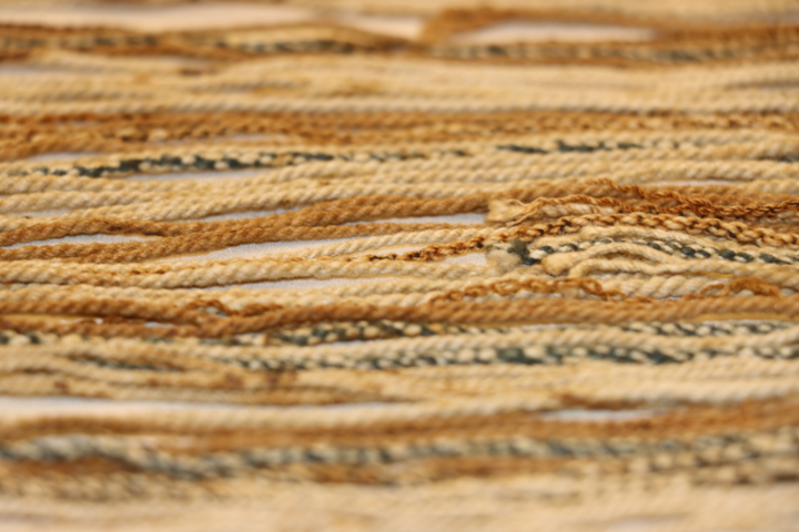 Cords on khipu 32-30-30/53 in the Harvard Peabody Museum of Archaeology and Ethnology (photo by Mackinley FitzPatrick).